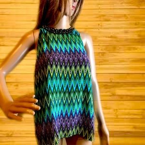 Jennifer Lopez blouse with Aztec design.